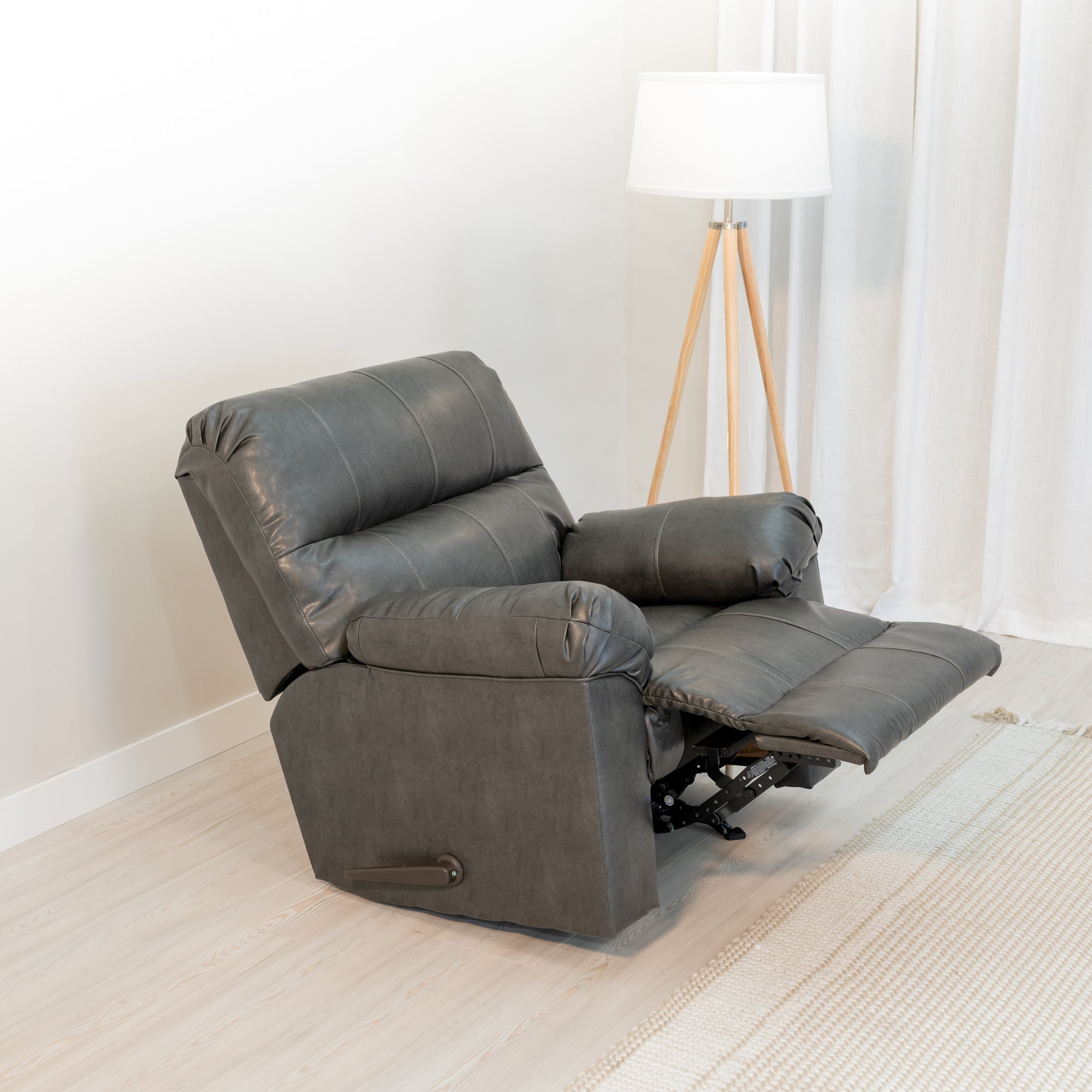 An angled view of the recliner showing an extending foot rest.